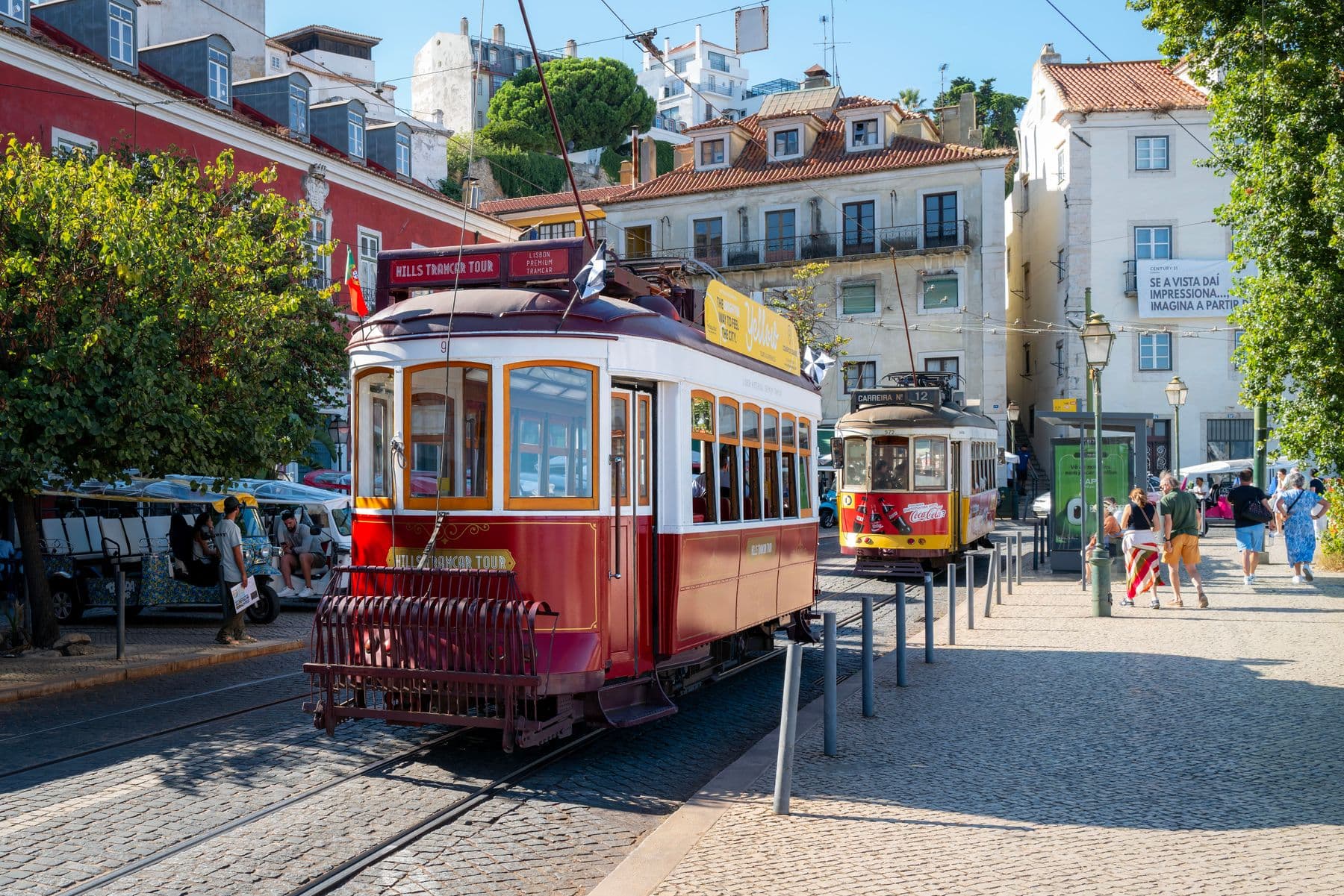 Sunlit rooftops and tiled buildings in Lisbon