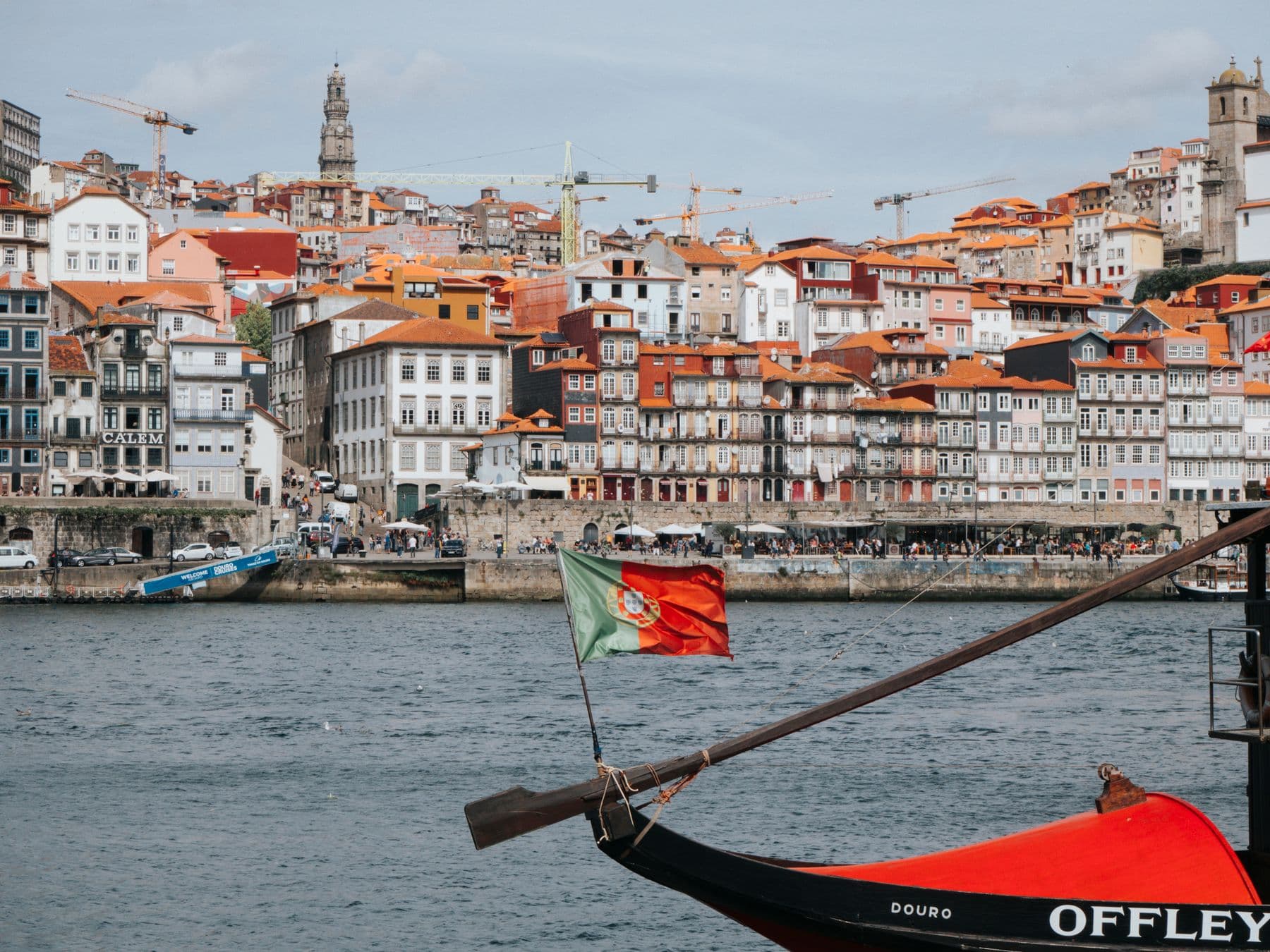 A rabelo boat and the colourful Ribeira waterfront in Porto